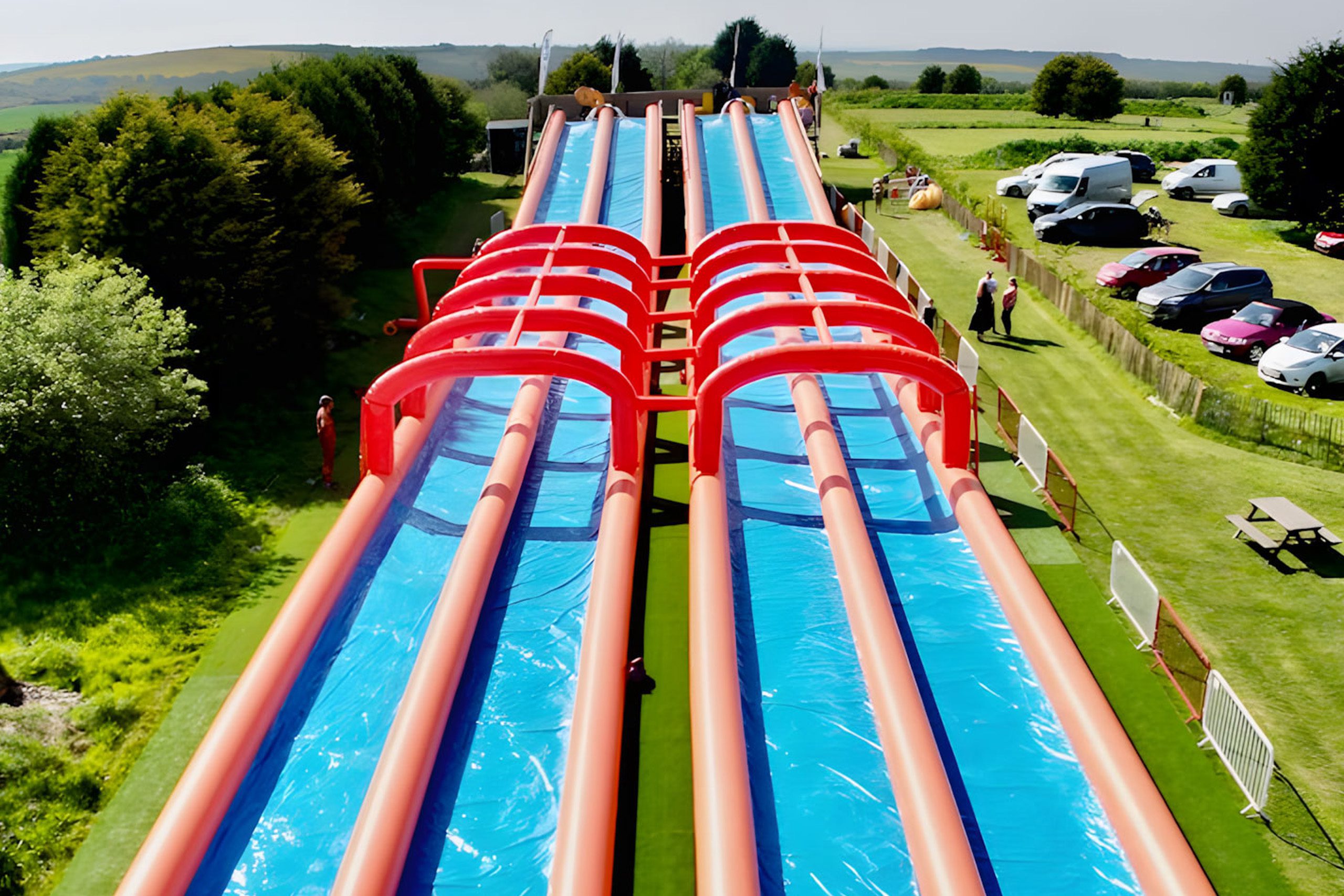 Giant inflatable slide at Cornwall Slip and Slide, Atlantic Reach Resort near Newquay